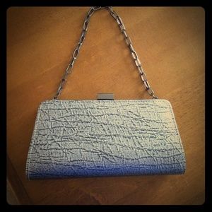 Metallic clutch like new condition